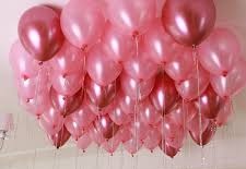 15 Gas filled pink Balloons tied to ribbons