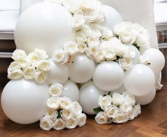 15 white small and large balloons with white flowers