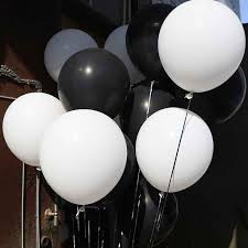 15 Gas filled black and white Balloons tied to ribbons