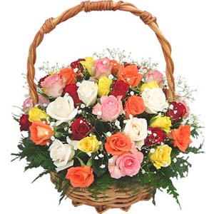 12 Mixed color flowers arrangement in a basket