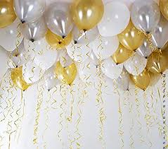15 Gas filled gold and silver Balloons tied to ribbons