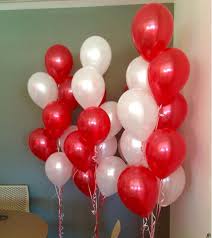 15 Gas filled red and white Balloons tied to ribbons