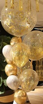 10 Gas filled gold silver Balloons with large air bobo balloons on top tied to ribbons