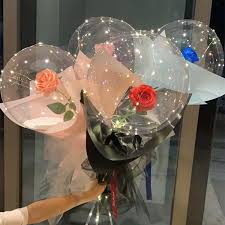Four Transparent bobo balloons with roses inside and LED Light for anniversary