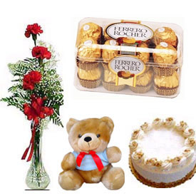 3 roses in a vase with 1 pound cake, chocolates and teddy