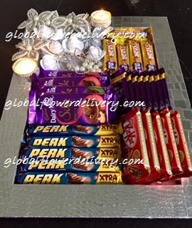 Decorated tray with 4 silk, 10 dairy milk, 5 5 star, 5 kitkat and 5 perk chocolates