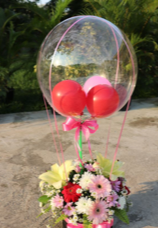 3 Balloons inside a Transparent balloon with basket of 40 flowers