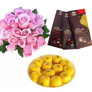 1/2kg kesar peda with 12 pink roses and 3 bournville