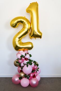 Double Digit Number Balloons with 20 dark pink and light pink balloons at base decorated with flowers and leaves - Mention Number in message box