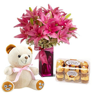 6 lilies vase,16 ferrero chocolates, 6 inch teddy