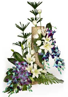 Lily roses and orchids arrangement