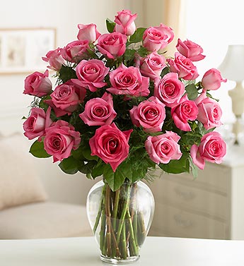 6 roses in a vase.