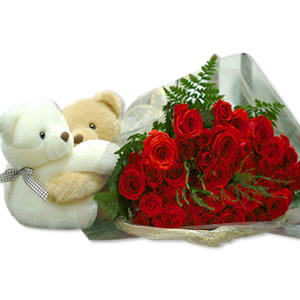 2 Teddys with 12 red roses.