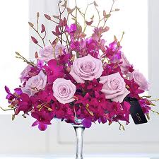 Orchids and roses arrangement