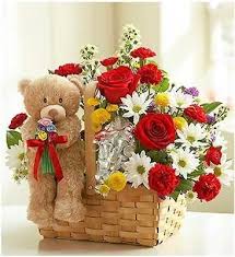 Flowers with teddy and chocolates