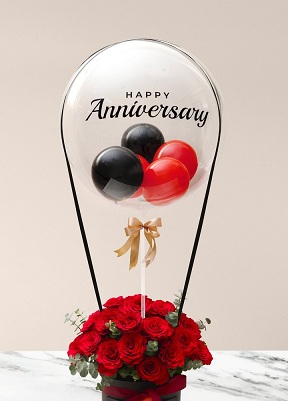 Happy anniversary transparent printed transparent balloon with 4 black and red balloons and 20 red roses arrangement 