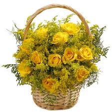 12 yellow roses in a basket