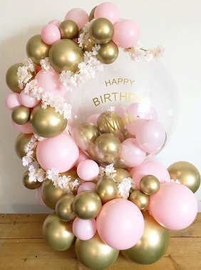 60 Gold white pink air balloons with flowers in between and big bubble balloon with happy birthday print