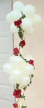 20 white air balloons with trailing roses and leaves