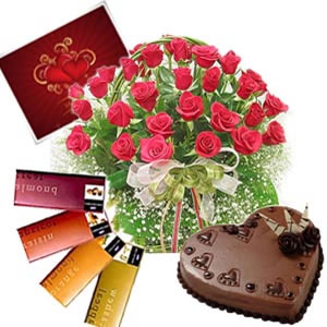 24 red roses basket with 4 temptation chocolates and 1 kg Cake and complimentary card