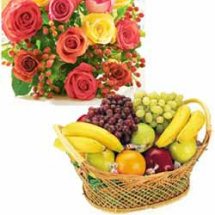 Fresh Fruit and assorted Flowers all in one basket