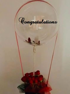 CONGRATULATIONS printed transparent balloon with 8 red roses arrangement 